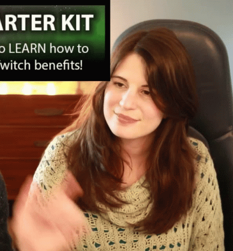 Woman Sitting In Front Of Sign Saying Starter Kit GIF