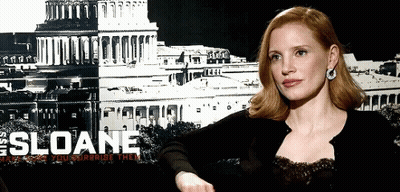 Woman Sitting In Front Of Sloane Poster GIF