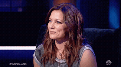 Woman Sitting In Front Of Songland Screen GIF