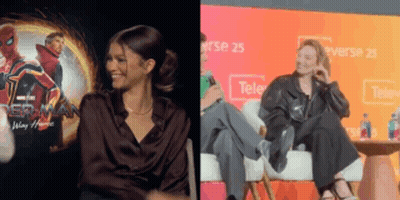 Woman Sitting In Front Of Spider-Man Poster GIF