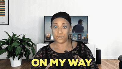 Woman Sitting In Front Of TV Saying On My Way GIF
