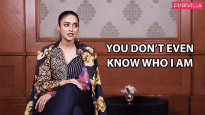 Woman Sitting In Front Of Wall You Don't Even Know Who I Am GIF