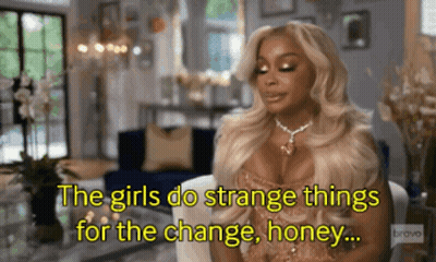 Woman Sitting In Living Room Saying The Girls Do Strange Things For The Change Honey GIF