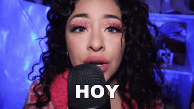 Woman Sitting In Pink Tank Top And Purple Headband GIF