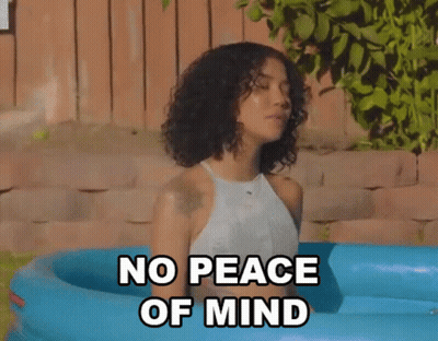 Woman Sitting In Pool No Peace Of Mind GIF