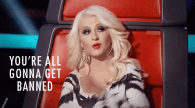 Woman Sitting In Red Chair Saying You're All Gonna Get Banned GIF