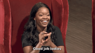 Woman Sitting In Red Chair Smiling GIF