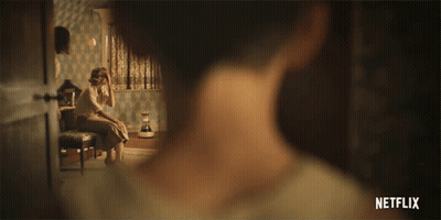 Woman Sitting In Room Netflix Ad GIF