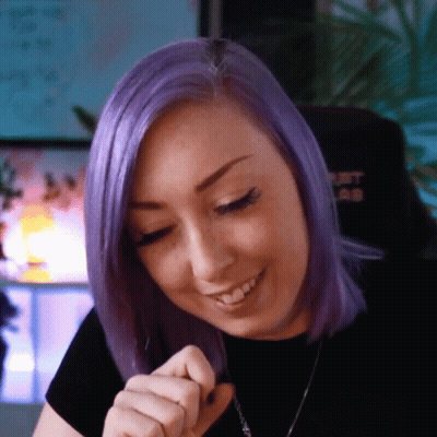 Woman Sitting In Stadium Wearing Apollo Shirt GIF