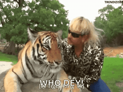 Woman Sitting Next To Tiger Saying Who Dey Tiger King GIF