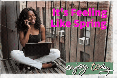 Woman Sitting On Balcony Using Laptop And Phone GIF