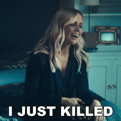Woman Sitting On Bed Saying I Just Killed GIF