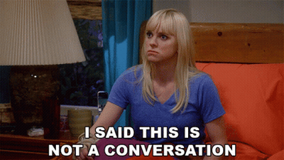 Woman Sitting On Bed Saying I Said This Is Not A Conversation GIF