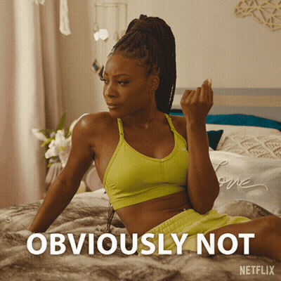 Woman Sitting On Bed Saying Obviously Not GIF