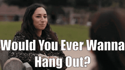 Woman Sitting On Bench Saying Would You Ever Wanna Hang Out GIF