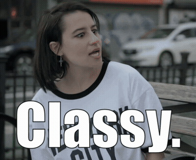 Woman Sitting On Bench With Classy Shirt GIF