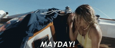 Woman Sitting On Boat With Mayday GIF