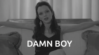 Woman Sitting On Couch Arms Outstretched Damn Boy GIF