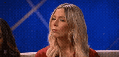 Woman Sitting On Couch Eyes Closed Mouth Open GIF