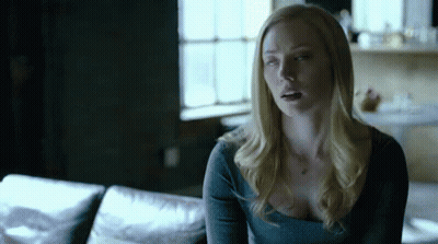 Woman Sitting On Couch Eyes Closed GIF