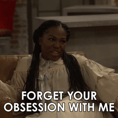 Woman Sitting On Couch Forget Your Obsession GIF