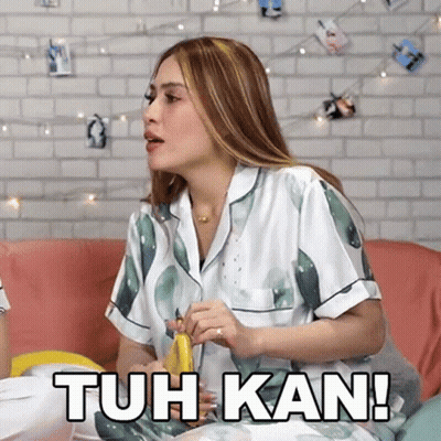 Woman Sitting On Couch Holding Banana Tuh Kan GIF