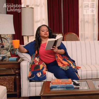 Woman Sitting On Couch Reading Pieces Of Our Soul GIF