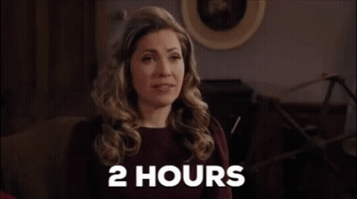Woman Sitting On Couch Saying 2 Hours GIF