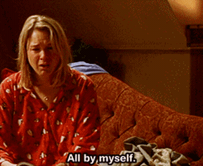 Woman Sitting On Couch Saying All By Myself GIF