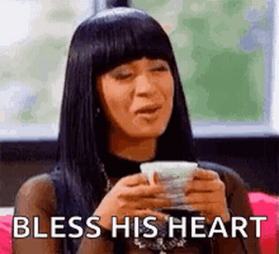 Woman Sitting On Couch Saying Bless His Heart GIF