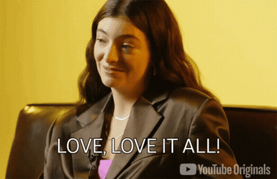 Woman Sitting On Couch Saying Love Love It All GIF