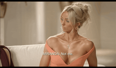 Woman Sitting On Couch Saying Miranda Not Me GIF