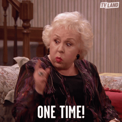 Woman Sitting On Couch Saying One Time GIF