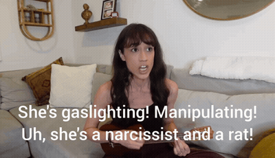 Woman Sitting On Couch Saying She's Gaslighting GIF