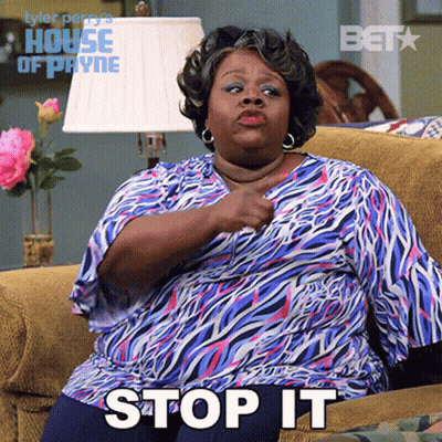 Woman Sitting On Couch Saying Stop It GIF
