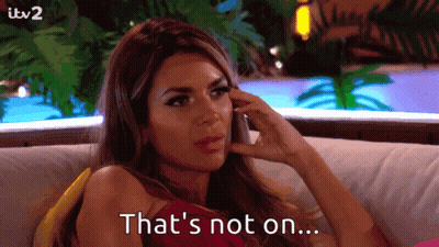 Woman Sitting On Couch Saying That's Not On GIF