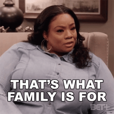 Woman Sitting On Couch Saying That's What Family Is For GIF