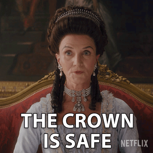 Woman Sitting On Couch Saying The Crown Is Safe GIF