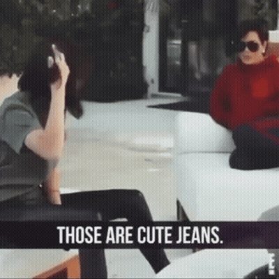 Woman Sitting On Couch Saying Those Are Cute Jeans GIF