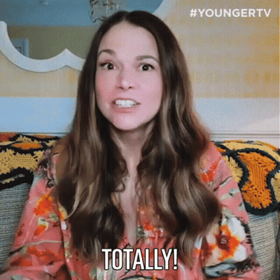 Woman Sitting On Couch Saying Totally GIF