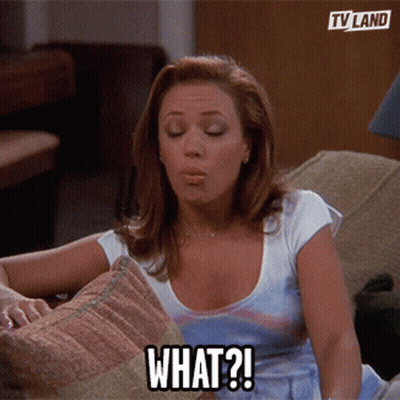 Woman Sitting On Couch Saying What GIF