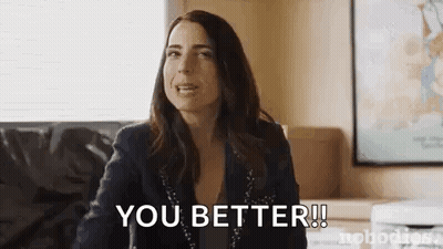 Woman Sitting On Couch Saying You Better GIF