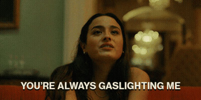 Woman Sitting On Couch Saying You're Always Gaslighting Me GIF
