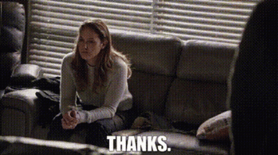 Woman Sitting On Couch Says Thanks GIF