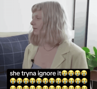 Woman Sitting On Couch She Tryna Ignore It GIF