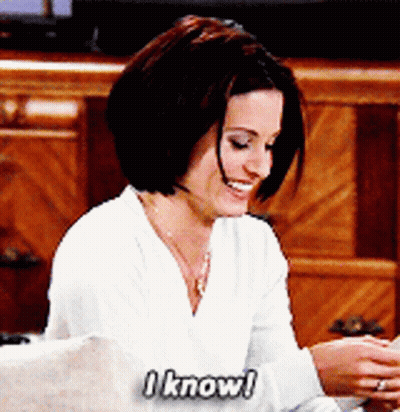 Woman Sitting On Couch Smiling I Know GIF
