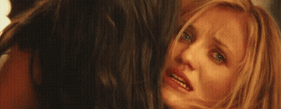 Woman Sitting On Couch With Arms In Air Rosa Diaz GIF