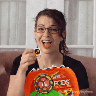 Woman Sitting On Couch With Bag Of Pods GIF