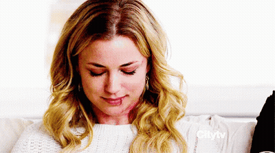 Woman Sitting On Couch With Citytv Shirt GIF