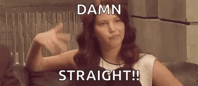 Woman Sitting On Couch With Damn Straight GIF